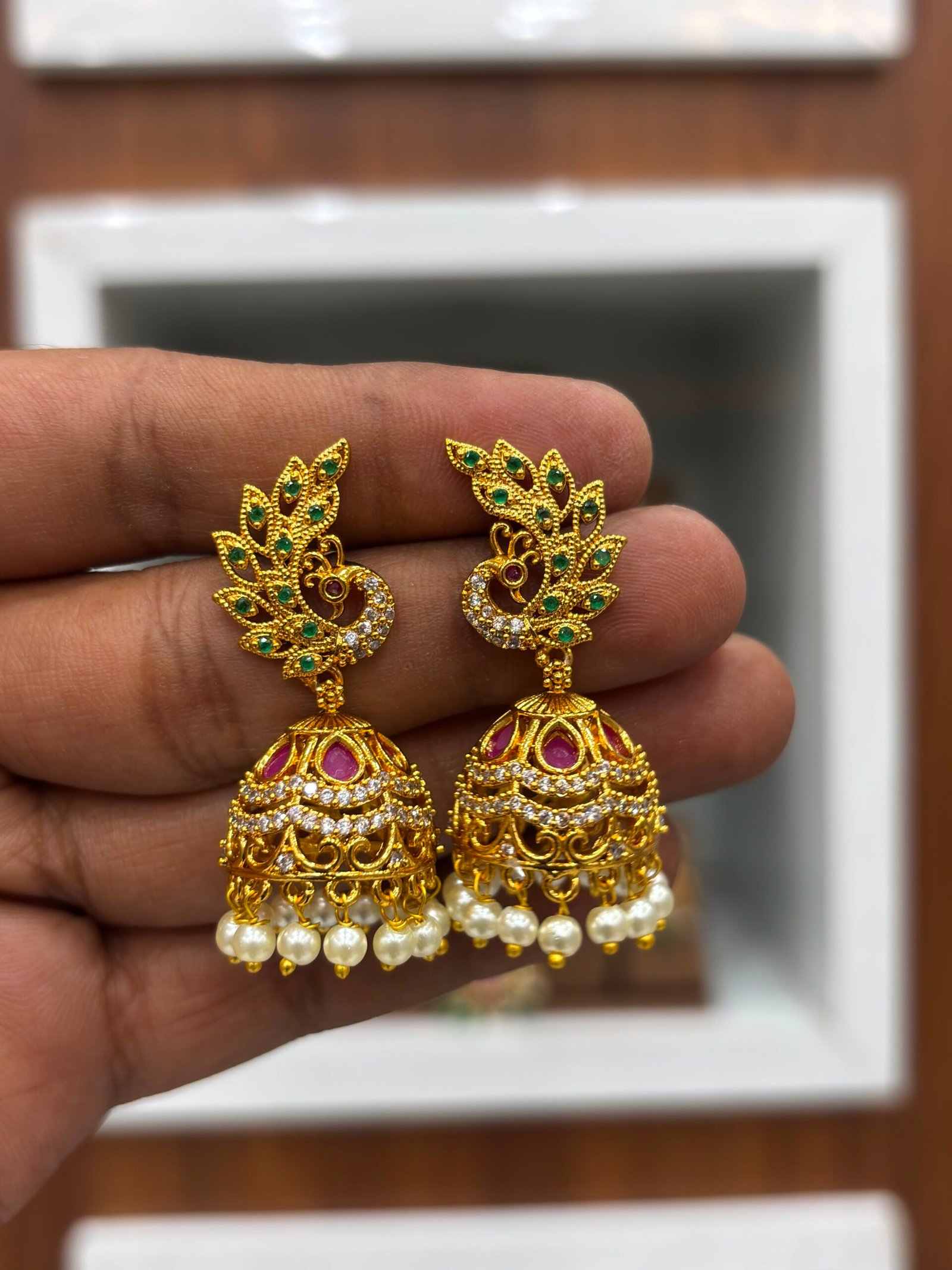 ad stone peacock jumka rs. 400 ad stone peacock jumka rs. 400