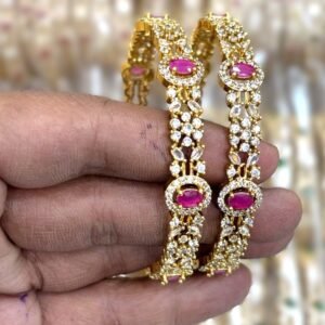 ad with pink stone bangle 2.6 rs.850