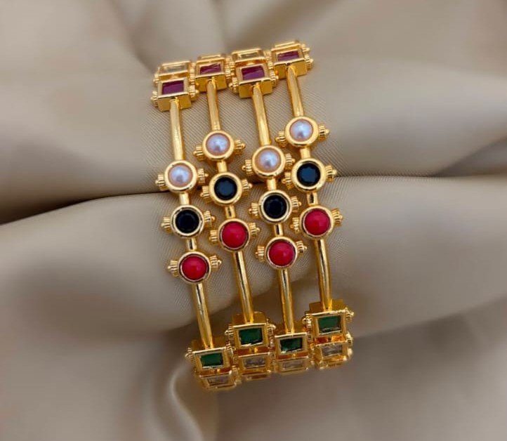 gold look alike multi stone bangles 2.8 rs.720 gold look alike multi stone bangles 2.8 rs.720