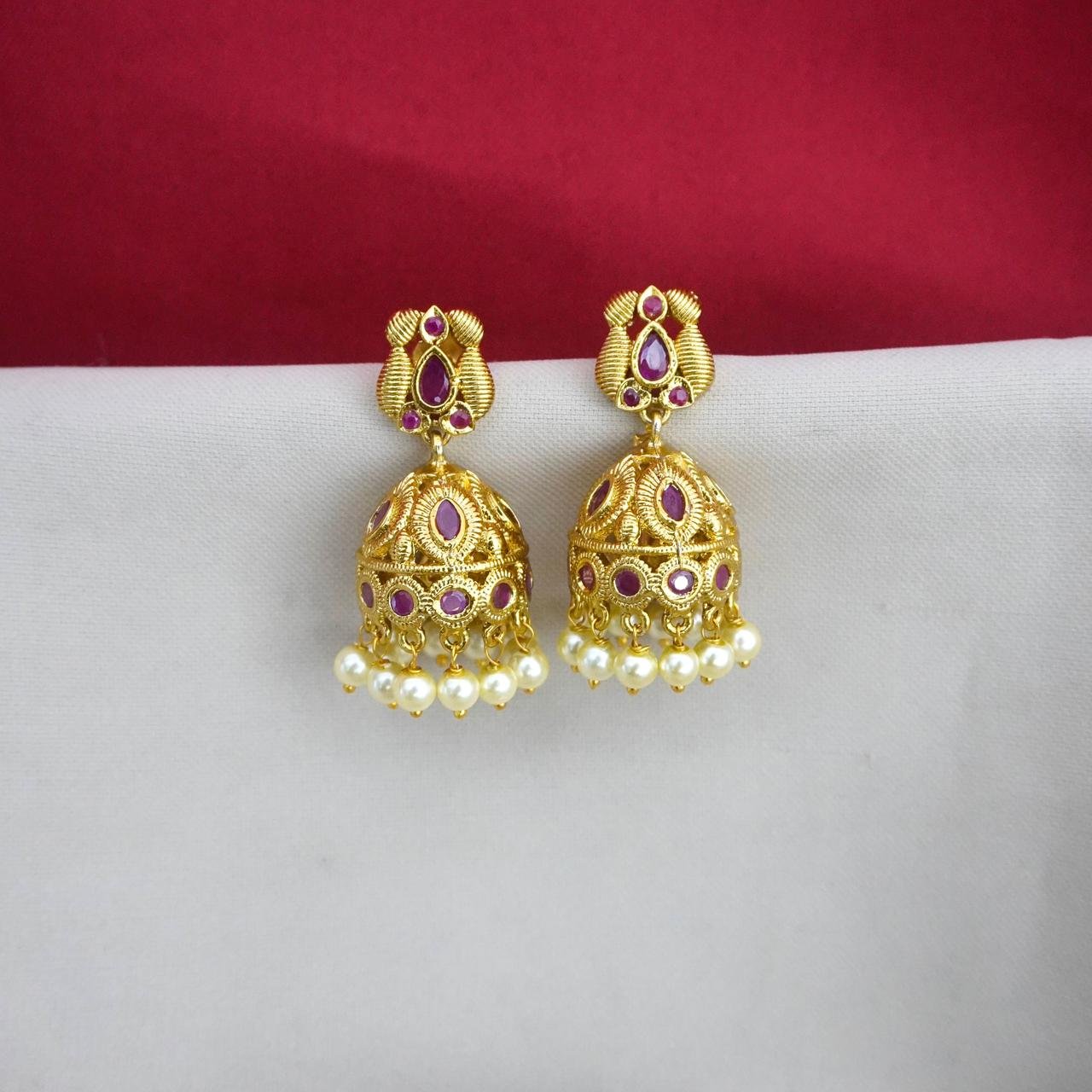 red stone gold colour jhumka rs. red stone gold colour jhumka rs.